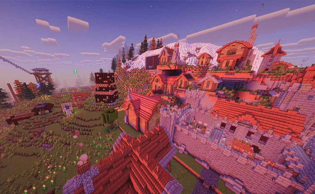 A town partly on a hill next to a snowy mountain